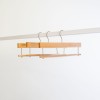 Cintre à barre antiglisse, bois de lotus  vernis finition mat, 35 cm