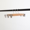 Cintre à pinces en bois de lotus vernis avec pinces et crochets 34 cm
