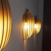 Assia, l'applique murale en bois design qui illumine votre espace