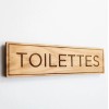 Plaque en bois Toilettes